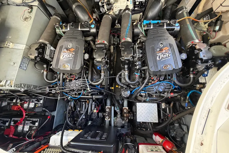Slide: The Image of Engine compartment of a 2003 Sea Ray Sundancer 320 with twin MerCruiser engines. - 38