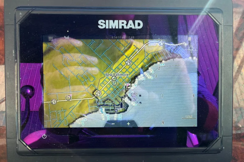 Slide: The Image of Simrad navigation display showing a map of New Baltimore on a Sea Ray Sundancer 320. - 17