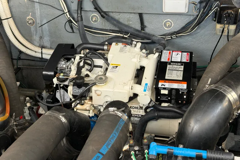 Slide: The Image of Engine compartment of a 2003 Sea Ray Sundancer 320 with Kohler generator. - 39