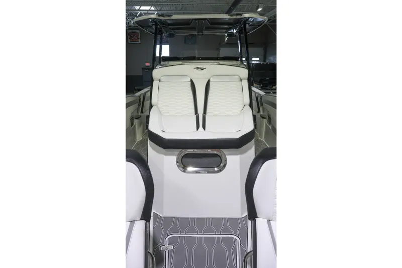 Slide: The Image of 2022 Sunsation 32 CCX boat interior with white seating and modern design. - 14