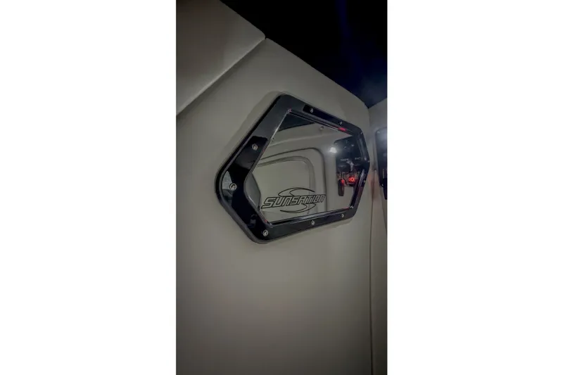 Slide: The Image of 2022 Sunsation 32 CCX interior detail with logo on a sleek, modern panel. - 17