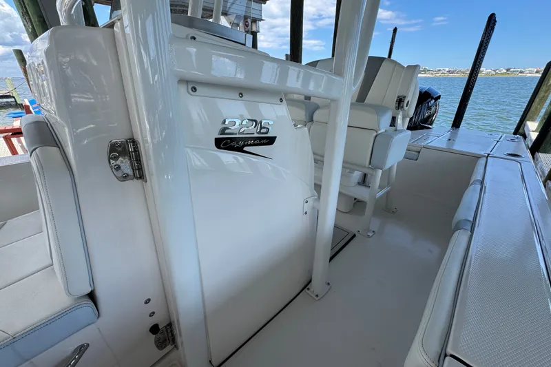 Slide: The Image of 2025 Robalo 226 Cayman boat interior with seating and console details. - 19