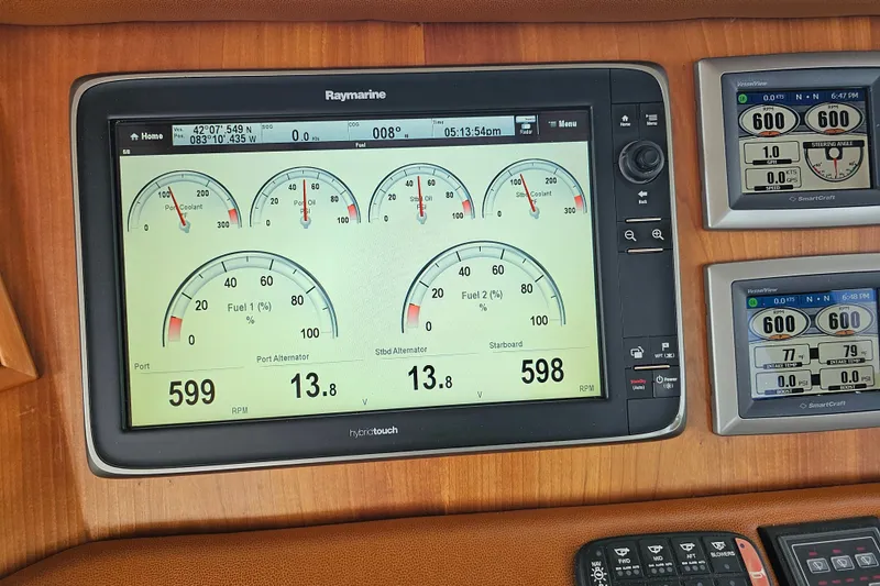 Slide: The Image of Raymarine navigation display on 2013 Sabre 48 Salon Express yacht dashboard. - 21
