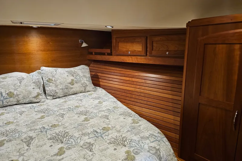 Slide: The Image of Luxurious wooden cabin interior of 2013 Sabre 48 Salon Express yacht bedroom. - 42