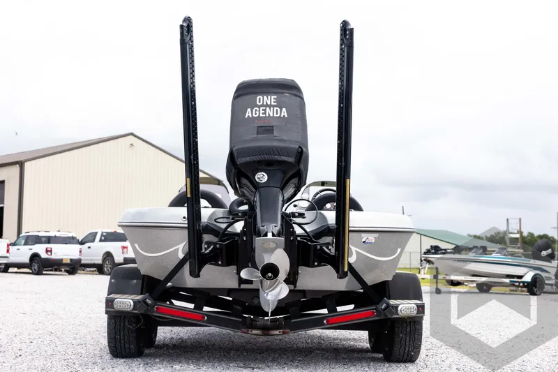 Slide: The Image of Rear view of 2015 Legend V-20 boat on trailer, outdoors. - 6