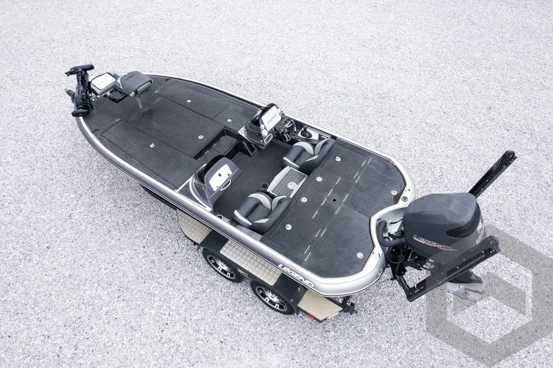 Slide: The Image of 2015 Legend V-20 fishing boat with dual consoles and trolling motor on trailer. - 38