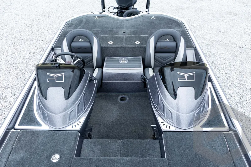 Slide: The Image of 2015 Legend V-20 boat interior with dual seats and steering console. - 23