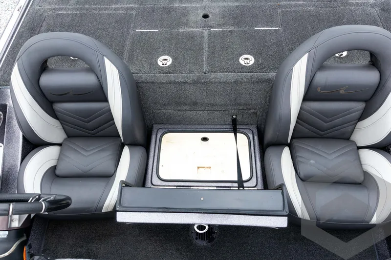 Slide: The Image of Interior of 2015 Legend V-20 boat with two cushioned seats and storage compartment. - 24