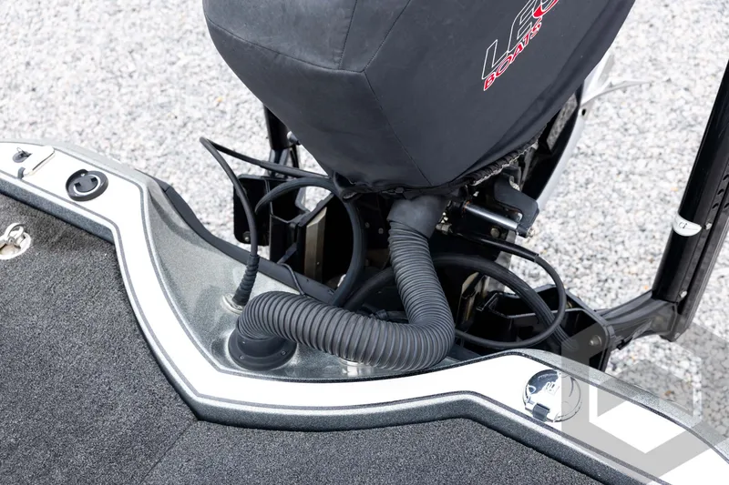 Slide: The Image of Legend V-20 boat engine area, 2015 model, featuring covered motor and wiring details. - 32