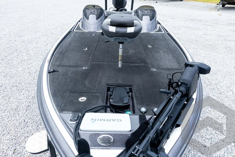 Slide: The Image of 2015 Legend V-20 boat deck with Garmin equipment and seating. - 16