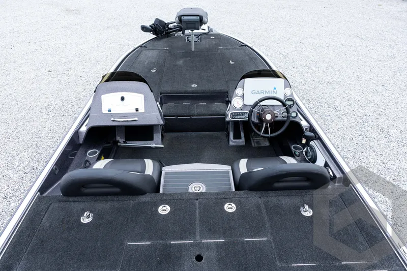 Slide: The Image of 2015 Legend V-20 boat interior with Garmin navigation system and dual seating. - 17