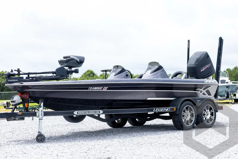 The Image of 2015 Legend V-20 boat on trailer, featuring sleek design and dual seats. - 1