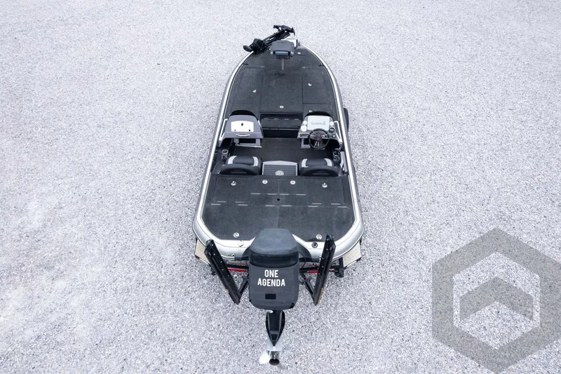 Slide: The Image of 2015 Legend V-20 fishing boat on gravel, featuring "One Agenda" motor cover. - 37