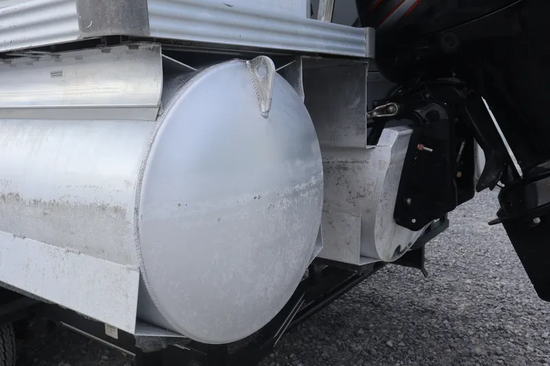 Slide: The Image of 2007 Manitou 22 Oasis pontoon boat underside and motor detail. - 23