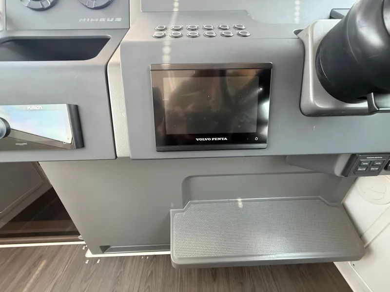 Slide: The Image of The image shows the dashboard of a 2024 Nimbus Commuter 11 with a Volvo Penta display. - 10