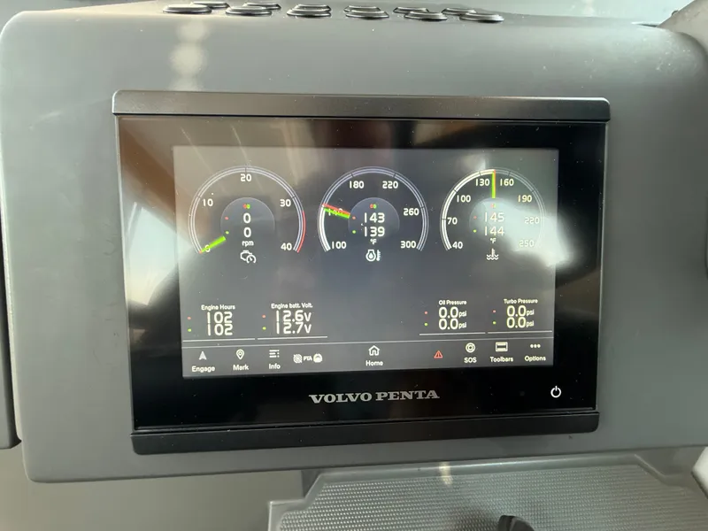 Slide: The Image of The image shows a Volvo Penta dashboard with digital displays for engine data. - 19