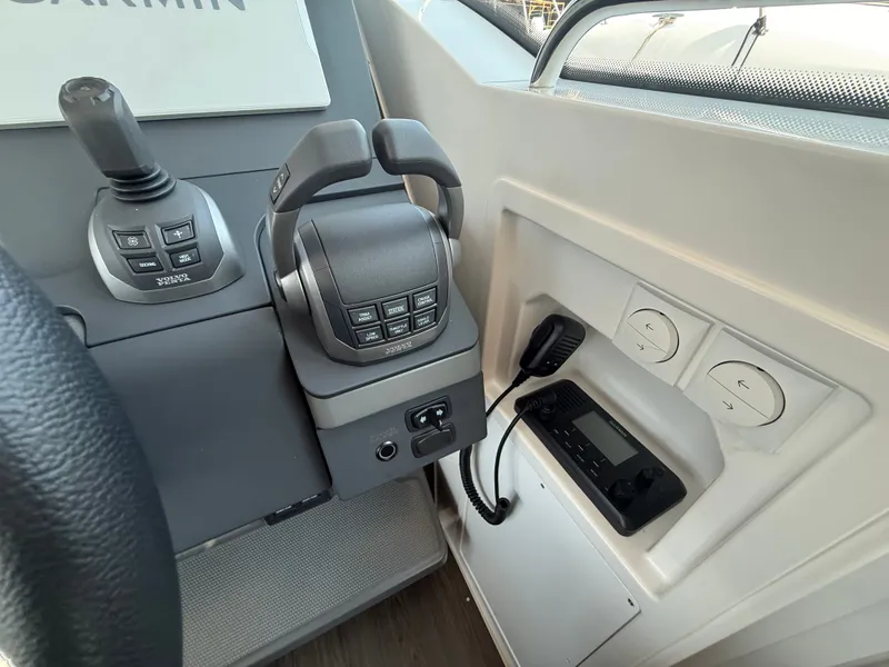 Slide: The Image of The image shows the cockpit of a 2024 Nimbus Commuter 11 with modern controls. - 11