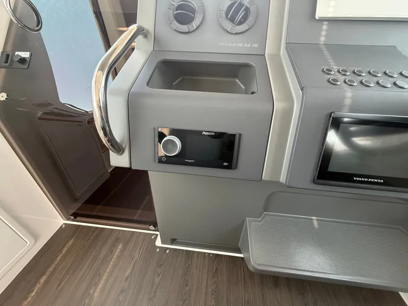 Slide: The Image of The image shows the dashboard of a 2024 Nimbus Commuter 11 with modern controls. - 9