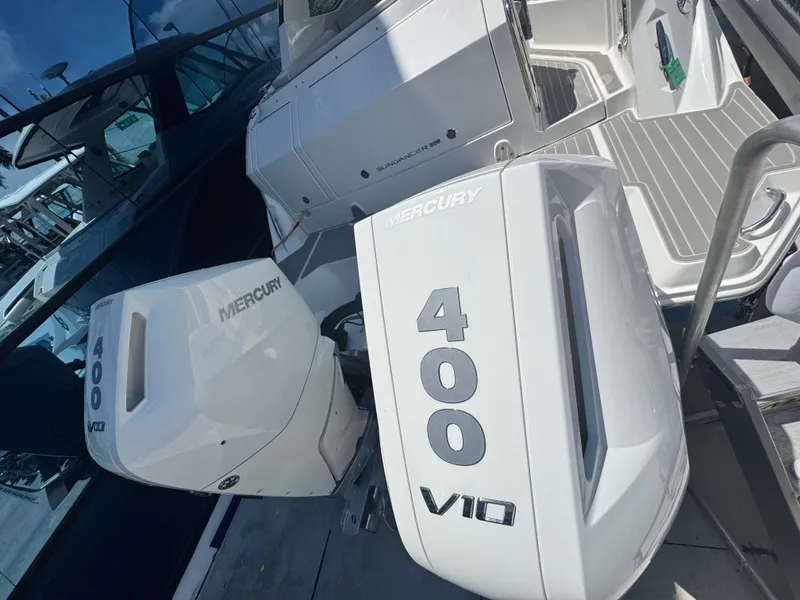 Slide: The Image of Two Mercury 400 V10 outboard engines on a 2027 Sea Ray Sundancer 320 Outboard. - 4