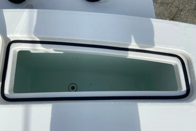 Slide: The Image of Livewell on 2022 Regulator 34 boat, featuring a sleek, rectangular design. - 19