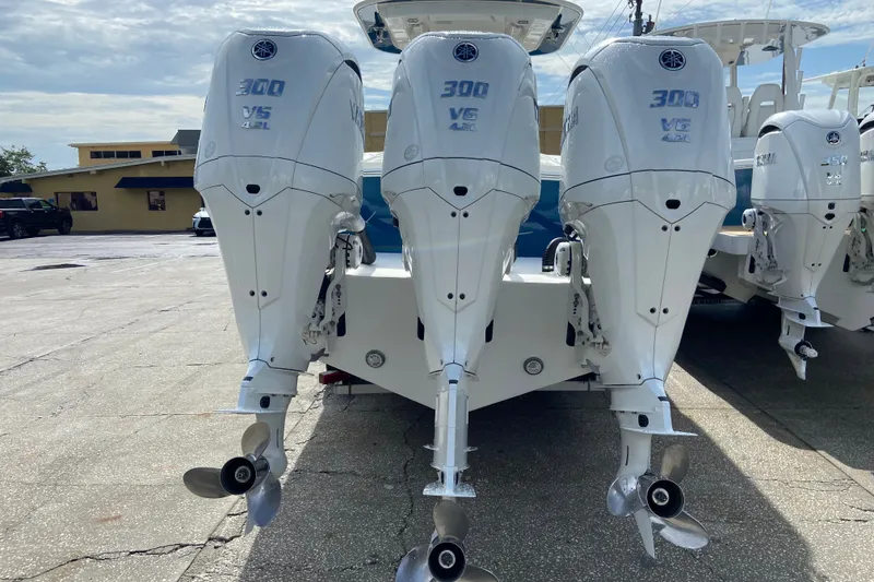 Slide: The Image of 2022 Regulator 34 boat with triple Yamaha 300 V6 outboard engines. - 14