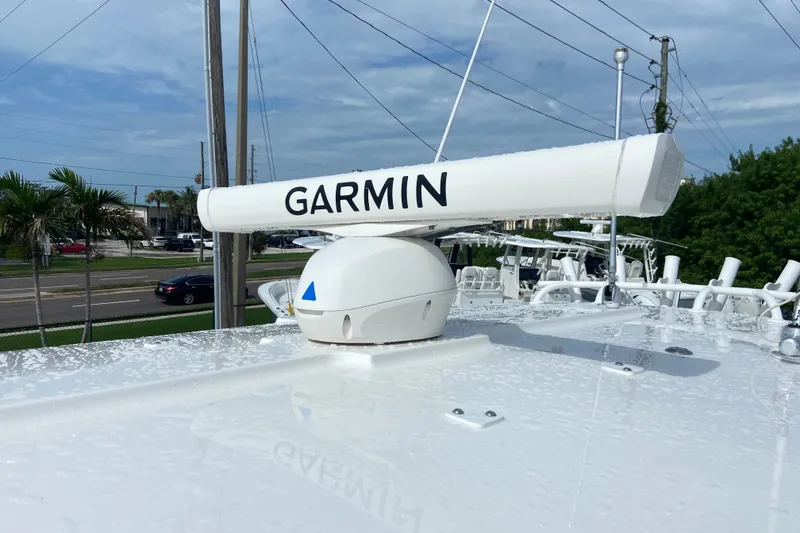 Slide: The Image of 2022 Regulator 34 boat with Garmin radar system on deck. - 32