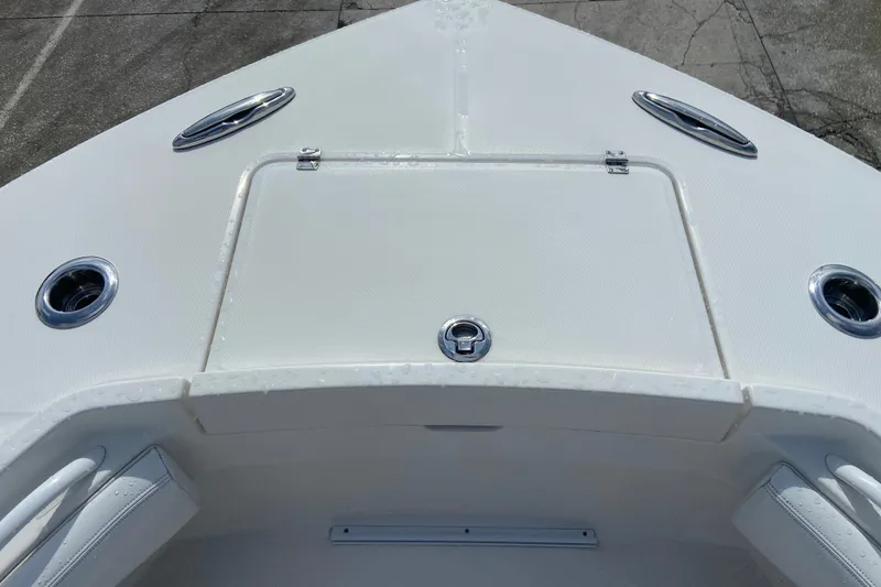 Slide: The Image of Bow of 2022 Regulator 34 boat with sleek design and stainless steel fittings. - 53