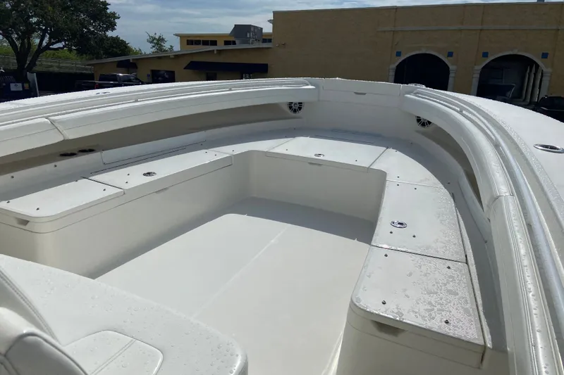 Slide: The Image of 2022 Regulator 34 boat interior with spacious seating and sleek design. - 48