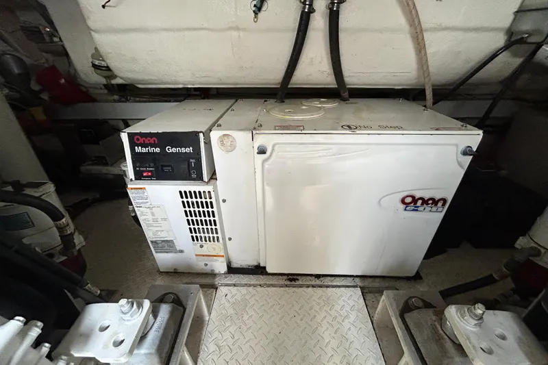 Slide: The Image of Onan Marine Genset in 2006 Cruisers Yachts 520 Express engine room. - 38