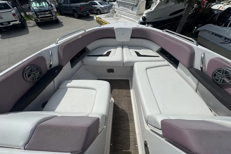Slide: The Image of 2017 Four Winns H290 boat interior with spacious seating and modern design. - 13
