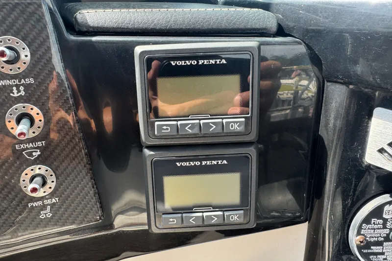 Slide: The Image of Control panel of a 2017 Four Winns H290 boat with Volvo Penta displays. - 19