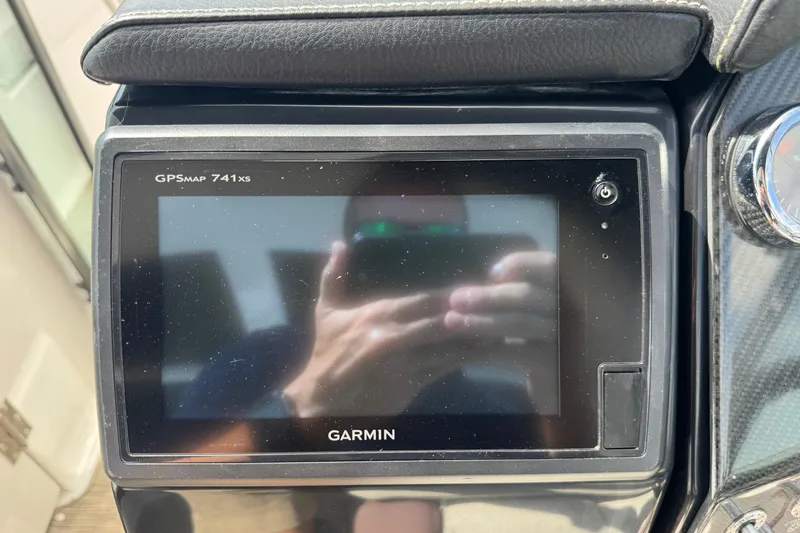 Slide: The Image of Garmin GPSMap 741xs on 2017 Four Winns H290 boat dashboard. - 24