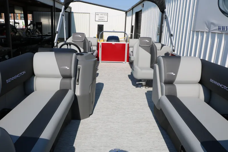 Slide: The Image of 2026 Bennington 22 SSR Tri-Toon interior with luxurious seating and modern design. - 19