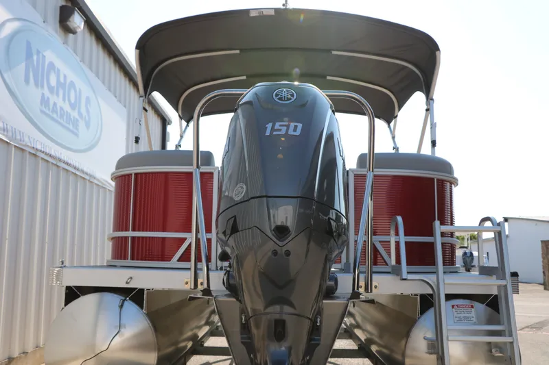 Slide: The Image of 2026 Bennington 22 SSR Tri-Toon boat with Yamaha 150 engine at Nichols Marine. - 15