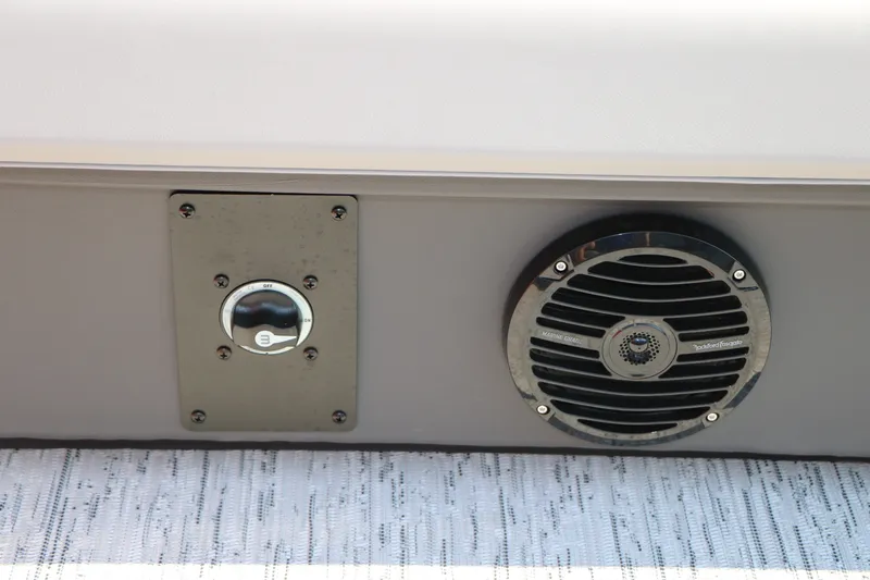 Slide: The Image of 2026 Bennington 22 SSR Tri-Toon speaker and control panel detail. - 36