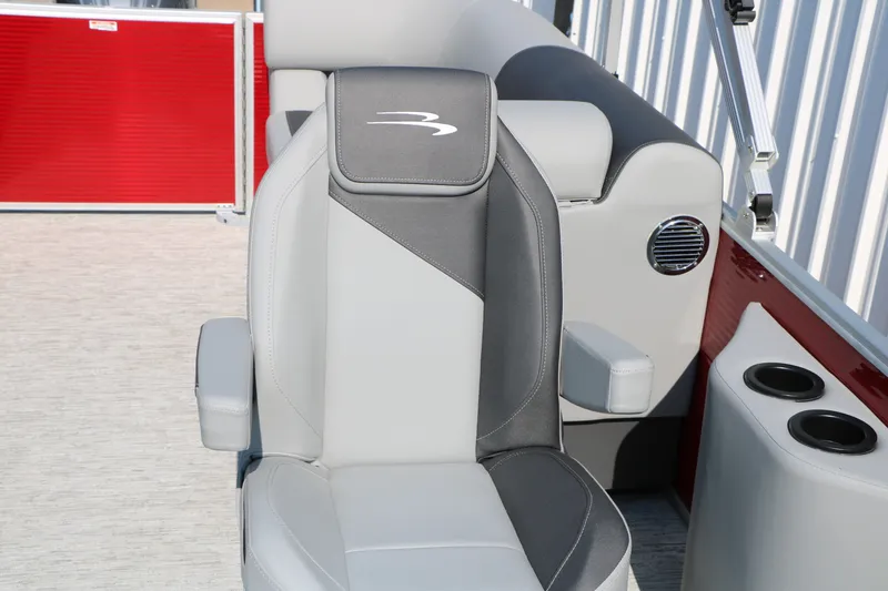 Slide: The Image of Luxury seating on 2026 Bennington 22 SSR Tri-Toon boat, featuring sleek design and cup holders. - 24
