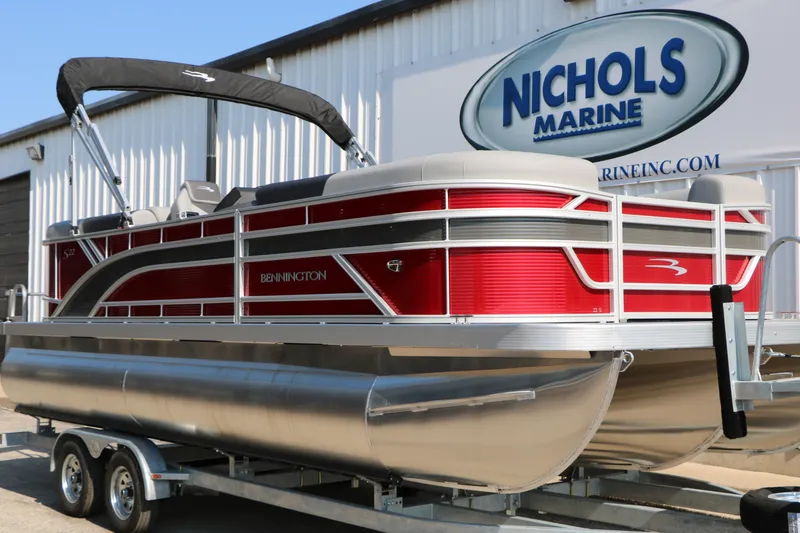Slide: The Image of 2026 Bennington 22 SSR Tri-Toon pontoon boat on trailer at Nichols Marine. - 41