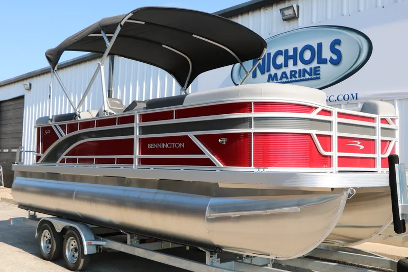 Slide: The Image of 2026 Bennington 22 SSR Tri-Toon pontoon boat with red exterior at Nichols Marine. - 4