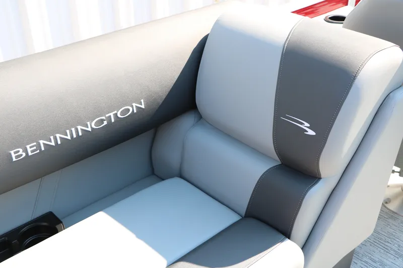 Slide: The Image of 2026 Bennington 22 SSR Tri-Toon boat seat with logo, featuring gray upholstery. - 37