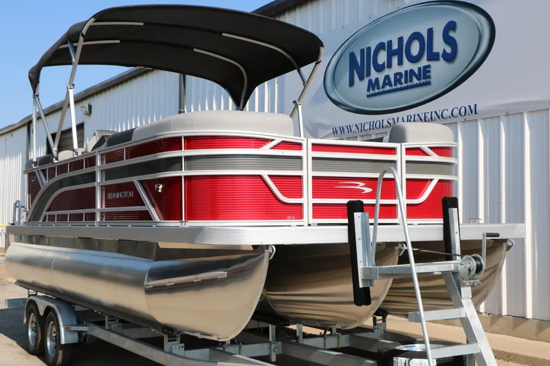 Slide: The Image of 2026 Bennington 22 SSR Tri-Toon boat on trailer at Nichols Marine dealership. - 6