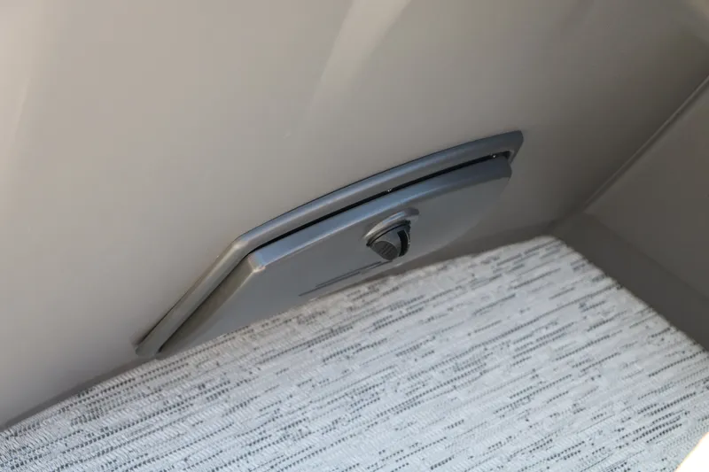 Slide: The Image of Storage compartment on 2026 Bennington 22 SSR Tri-Toon boat interior. - 31