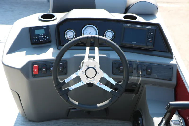 Slide: The Image of Steering console of 2026 Bennington 22 SSR Tri-Toon with gauges and controls. - 38