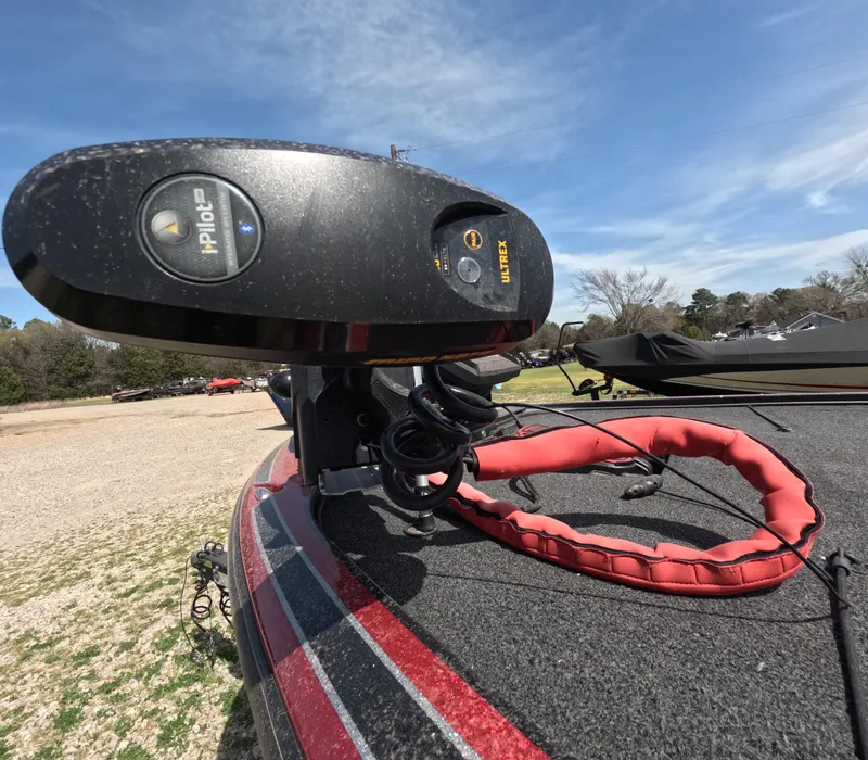 Slide: The Image of 2019 Nitro Z19 boat with i-Pilot trolling motor on deck under clear sky. - 2