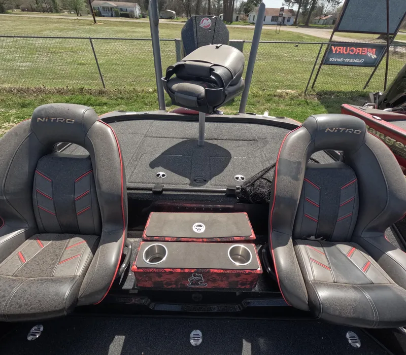 Slide: The Image of 2019 Nitro Z19 boat interior with dual seats and storage compartment. - 16