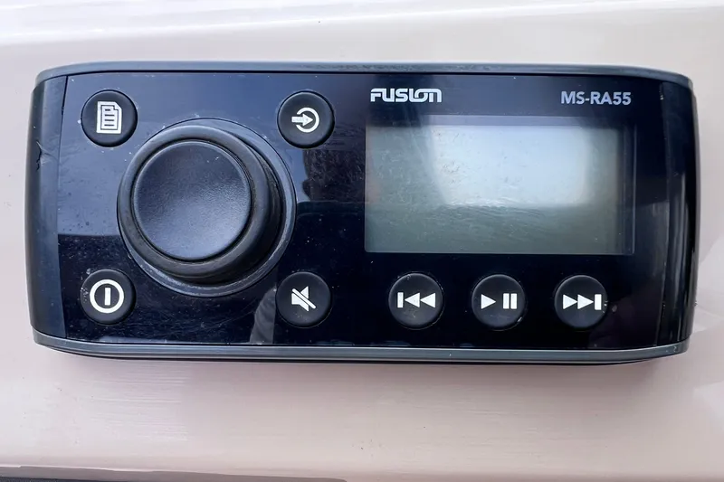 Slide: The Image of Fusion MS-RA55 marine stereo on 2021 Godfrey Sweetwater 2086 C boat dashboard. - 23