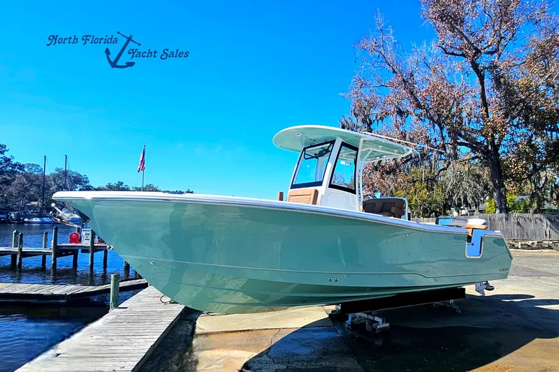 The Image of 2026 Sea Hunt Ultra 275 Coffin Box boat at North Florida Yacht Sales dock. - 0
