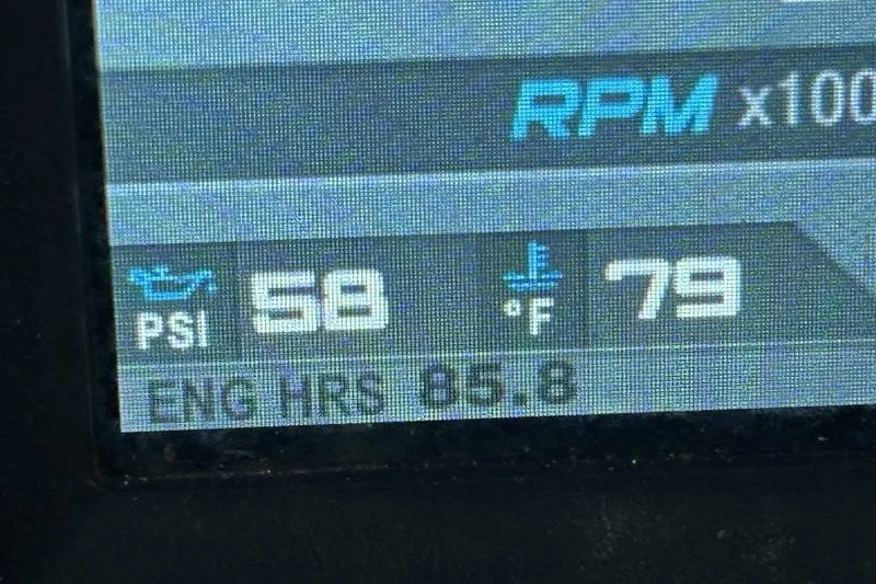 Slide: The Image of Display panel showing RPM, PSI, temperature, and engine hours for 2015 South Bay 524 SLTT. - 6