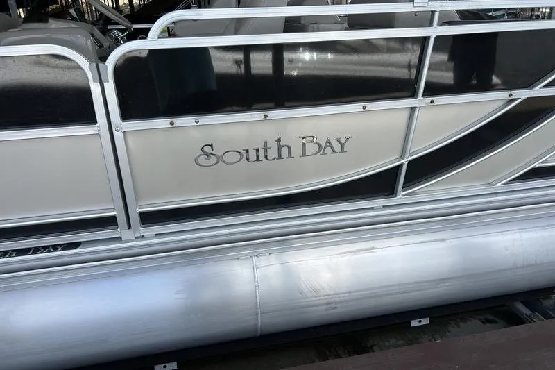 Slide: The Image of 2015 South Bay 524 SLTT pontoon boat with sleek design and metallic finish. - 3