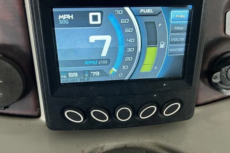 Slide: The Image of Dashboard display of a 2015 South Bay 524 SLTT showing speed, RPM, and fuel levels. - 7