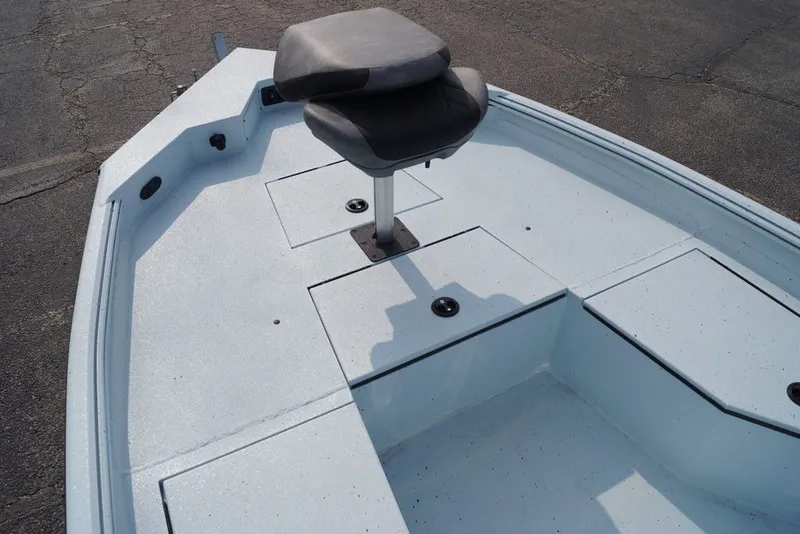 Slide: The Image of 2027 Excel 203 Bay Pro Elite boat deck with seating and storage compartments. - 14